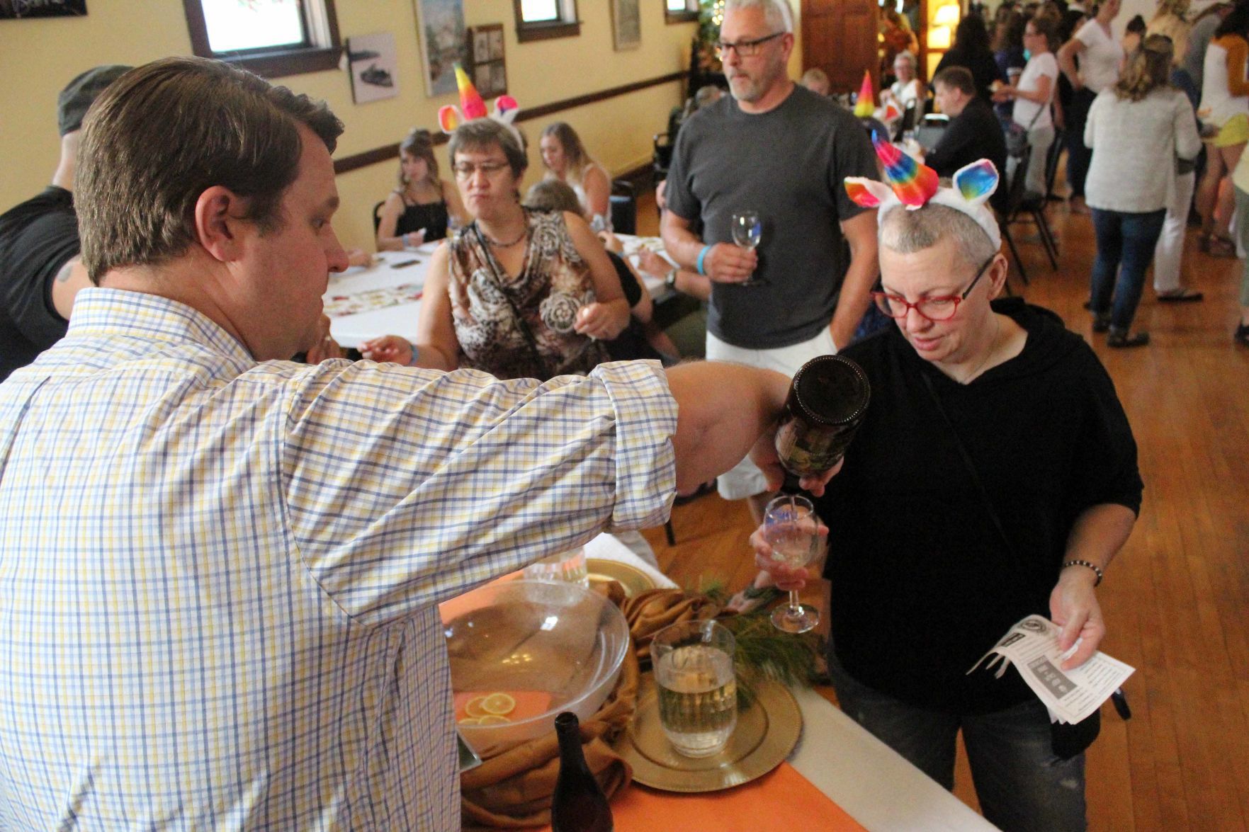 Darryl pours Rae wine
